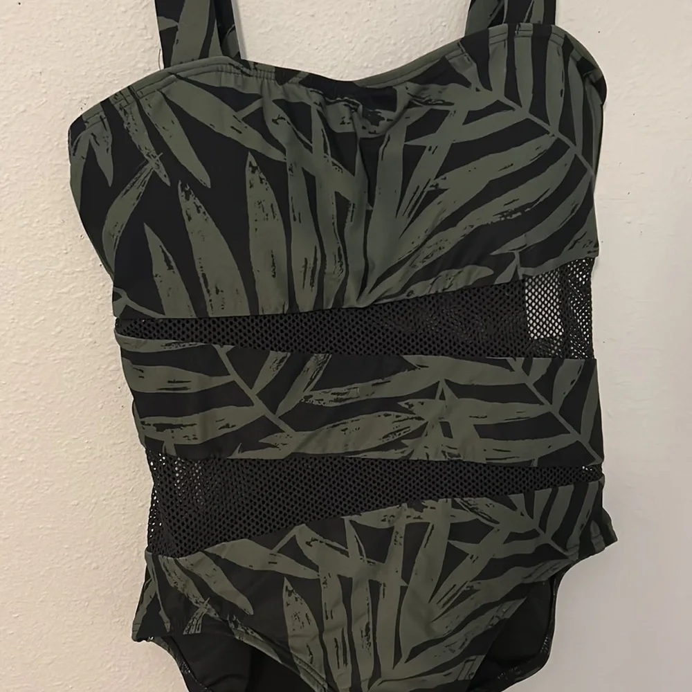 NWT Carmen Marc Valvo one piece swimsuit. Black w/green palms, mesh, size 12.